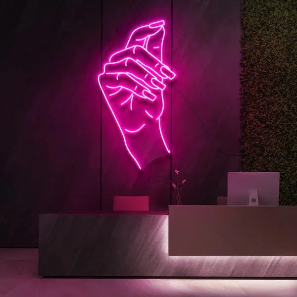 Elegant and Stylish Design Neon Sign Gracefully Poised Hand in Vivid Pink Glow for Beauty and Cosmetic Studios