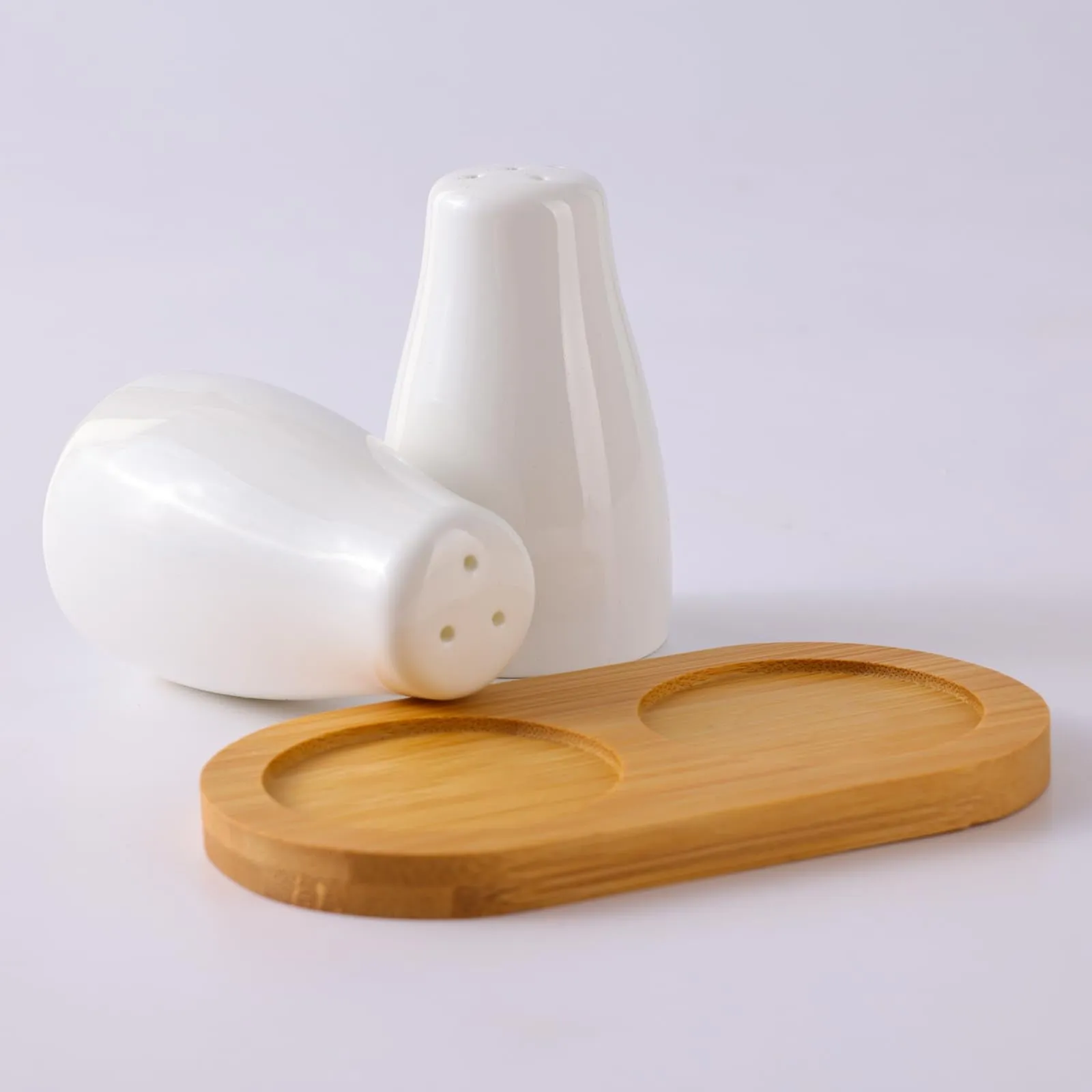 The Better Home Ceramic Salt and Pepper Shakers Set (Pack of 1) with Wooden Tray | Dining Table Decorative Items | Salt Pepper Set for Dining Table | Salt and Pepper Shaker | White