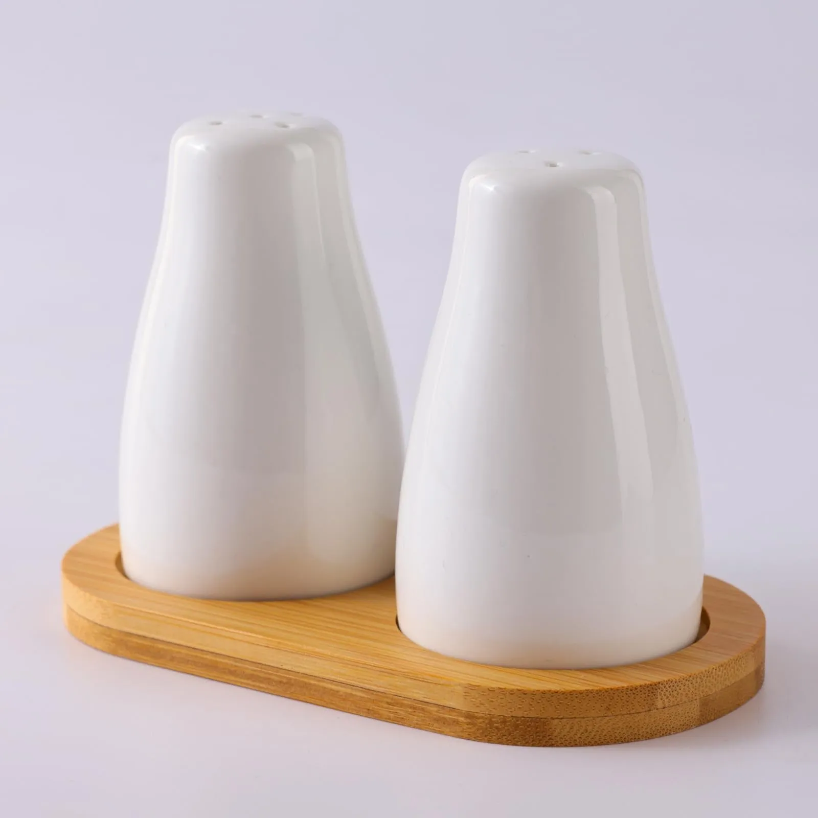 The Better Home Ceramic Salt and Pepper Shakers Set (Pack of 1) with Wooden Tray | Dining Table Decorative Items | Salt Pepper Set for Dining Table | Salt and Pepper Shaker | White