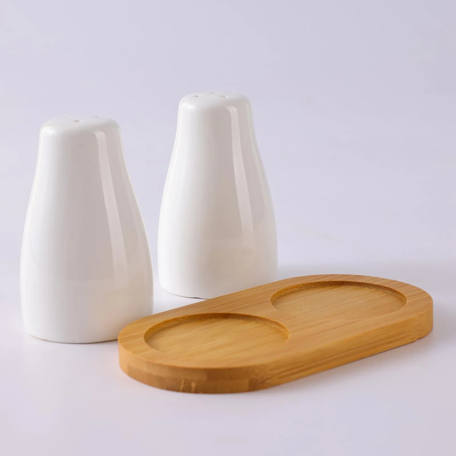 The Better Home Ceramic Salt and Pepper Shakers Set (Pack of 1) with Wooden Tray | Dining Table Decorative Items | Salt Pepper Set for Dining Table | Salt and Pepper Shaker | White